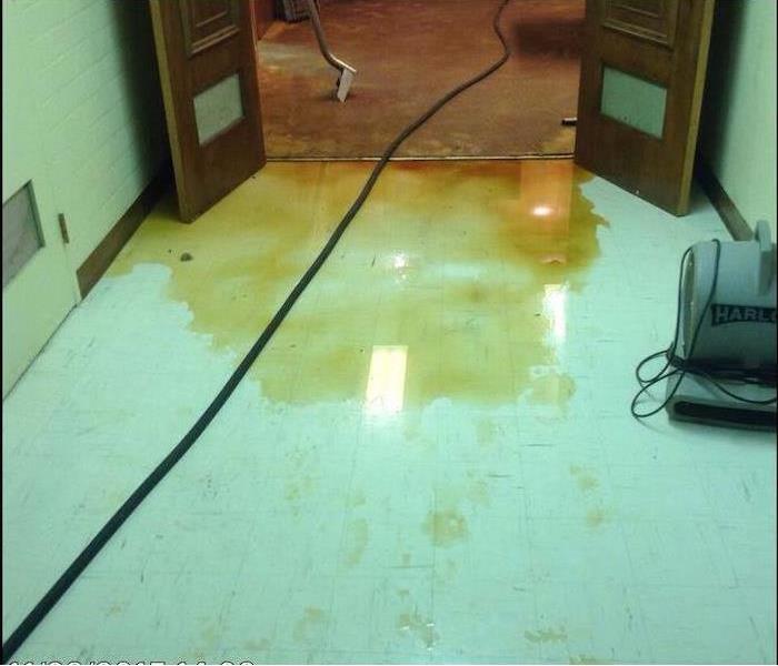 Water damage on floor. 